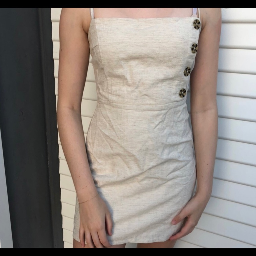 Linen mini dress with button details